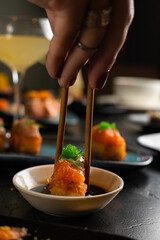 Sushi on Black Stone Table