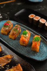 Sushi on Black Stone Table