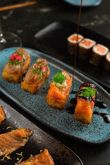 Sushi on Black Stone Table