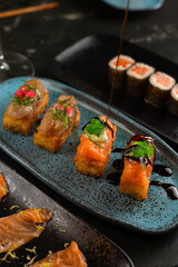 Sushi on Black Stone Table