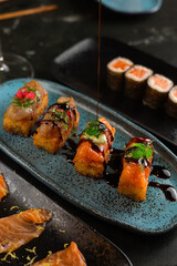 Sushi on Black Stone Table