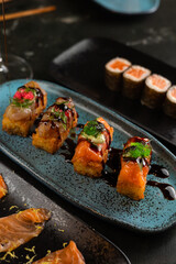 Sushi on Black Stone Table