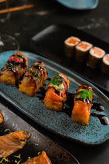Sushi on Black Stone Table