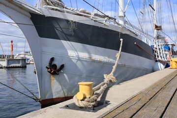 A sailing vessel moored to the quay at the marina in Sopot.