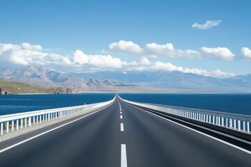 Fototapeta premium highway with white lines, a sea and sky background
