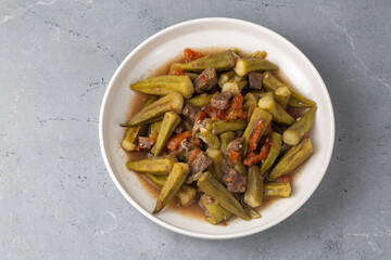 Bamya, Turkish traditional food. (Turkish cuisine) Homemade Food Okra in Plate.