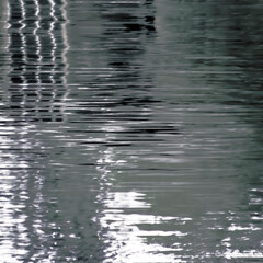 Illuminated Silvery Reflective Gray Ripples of Lake Water-Modern Abstract, interesting, Serene, Peaceful, Calm, Spa Like Feel - Backdrop, Background, Wallpaper, Border - metallic look (filtered photo)