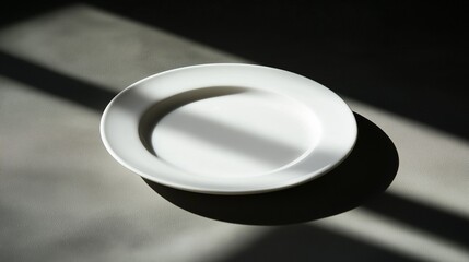 white plate placed on a neutral surface