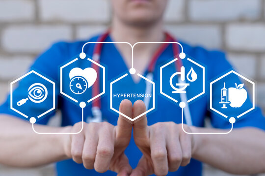 Cardiologist working on virtual touch screen presses word: HYPERTENSION. Hypertension Heart Disease Medical concept. Hypertensive crisis examination and treatment.