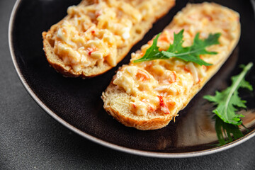smorrebrod salad spread surimi and crab sticks, mayonnaise fresh meal food snack on the table copy space food background rustic top view