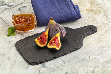 Purple ripe fig with cut