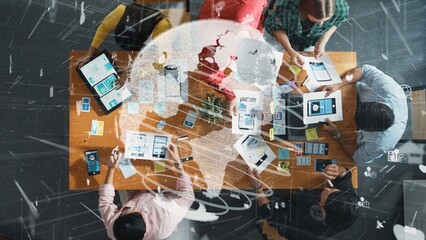 Top aerial view of skilled business team working together to design Ux Ui designing. Group of diverse people brainstorming and discussing about global communication by using big database. Convocation.