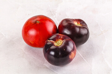 Black ripe juicy organic tomato
