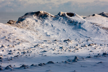 Ice volcanoes, currently inactive, along the Lake Michigan shoreline at Harrington Beach State...