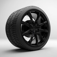 Obraz premium The tyre of a black rubber automobile wheel resting on a transparent background. It consists of silver metal, steel or aluminum rims.