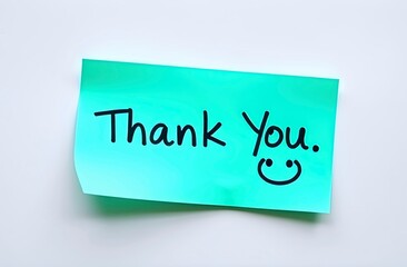 A Colorful Note Expressing Gratitude With a Friendly Smiley Placed on a Light Background