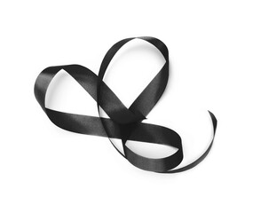 Red pink color wave silk ribbon with light shadow on white background.