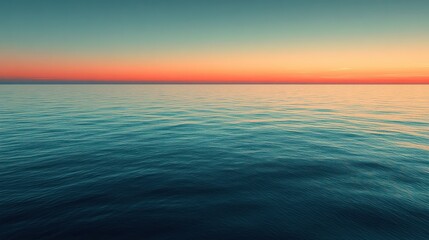 Obraz premium Soft waves gently lap at the surface of the ocean, reflecting vibrant colors as the sun sets below the horizon