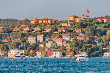 Istanbul old town and houses stretch along the shore, blending history and nature in a picturesque...