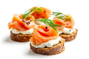 Canapes with red salmon and cream cheese isolated on white background