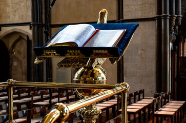 Naklejka premium The book in the church
