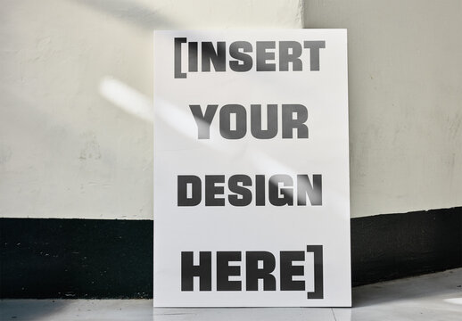 Mock Of Sign Leaning Against Wall In Corner Of A Hallway.