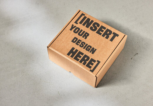 Mockup Of Brown Cardboard Box On Plan Grey Surface. 