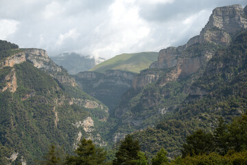tree lined rock outrcrops and glacial formations, gorges and canyons in mountains, Spain