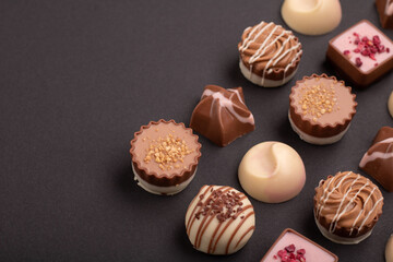 photo, show, assortment, assorted, chocolate, background, truffle, shape, gourmet, size, design, decorated, nut, topping, type, luxury, various, brown,  sweet, treat, candy, gift, delicious, dessert