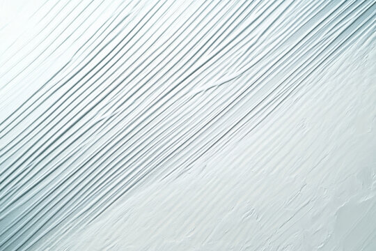 A bright textured surface with a subtle, linear texture, featuring fine, parallel lines that catch and reflect light dynamically.
