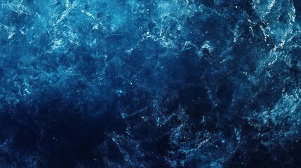 Fototapeta premium A mesmerizing deep blue ocean surface, capturing the beauty of sea waves reflecting light in an elegant pattern.