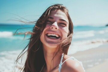 A joyful young woman laughs carefree by the beach under the bright sun, embracing the beauty of a perfect summer day