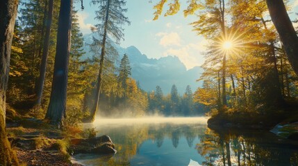 Obraz premium Sunset scene near Hintersee lake with trees and turquoise water in autumn