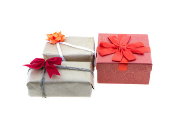 gifts in craft paper and a red bow on an isolated background
