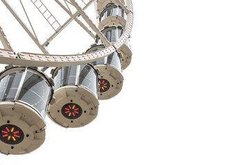 Ferris wheel booths close up in modern style on gray sky background