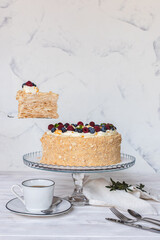 Napoleon cake on a white background. Confectionery, baked goods.