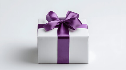 Obraz premium White gift box with purple ribbon on white backdrop