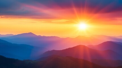 Obraz premium A beautiful mountain range with a bright orange sun in the sky