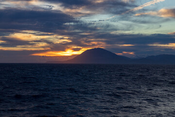 Fototapeta premium Sunset in the Aegean sea, somewhere around Greece, from the open deck of a cruise ship