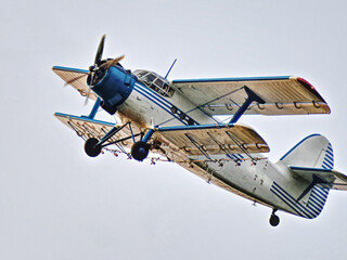 Old propeller-driven aircraft in flight