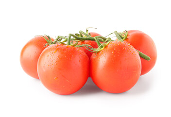 Many fresh cherry tomatoes on white background