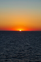 Naklejka premium Greek sunsets over the Aegean sea during summer 