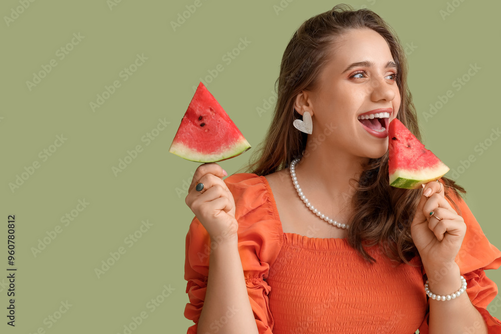 Canvas Prints beautiful young happy woman with pieces of fresh watermelon on sticks against green background