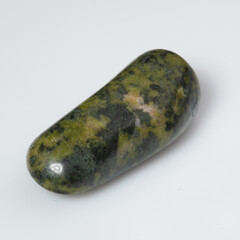 Elegant Polished Serpentine Gemstone on Pristine White Background