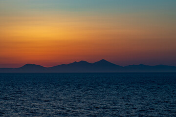 Greek sunsets over the Aegean sea during summer 