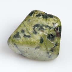 Exquisite Tumbled Serpentine Gemstone on Pristine White Background