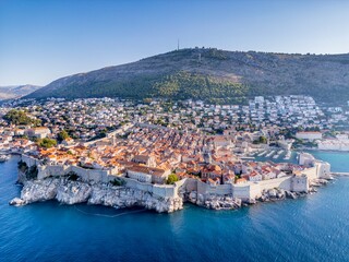 Obraz premium Dubrovnik, Croatia - August 8, 2024: Aerial view of Dubrovnik old town and harbor
