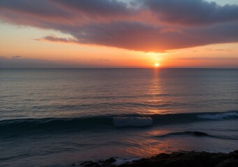Sunset Over Calm Ocean Waves