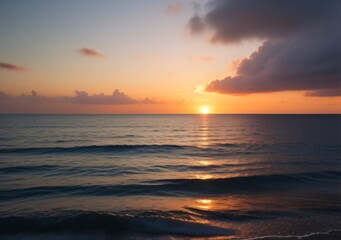 Obraz premium Sunset Over Calm Ocean Waves