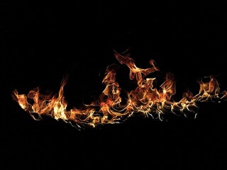 Dynamic Abstract Background Featuring Vibrant Flames Against a Dark Backdrop